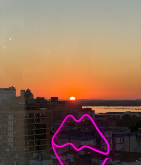 Vista do consultório no Moinhos de Vento ao pôr do sol